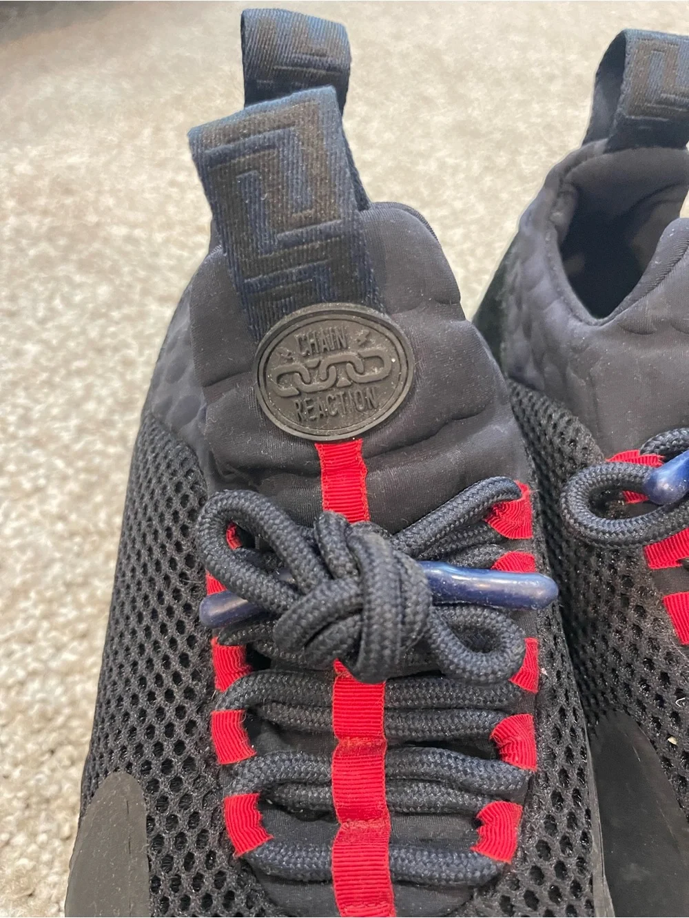 Versace Black Athletic Sneakers with Red Lace Accents